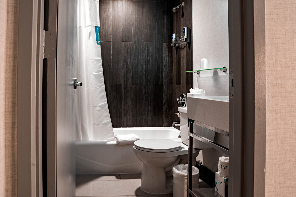 a bathroom with a toilet and sink