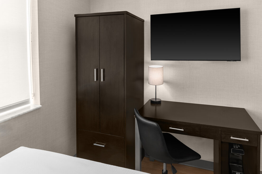 a desk and chair in a room